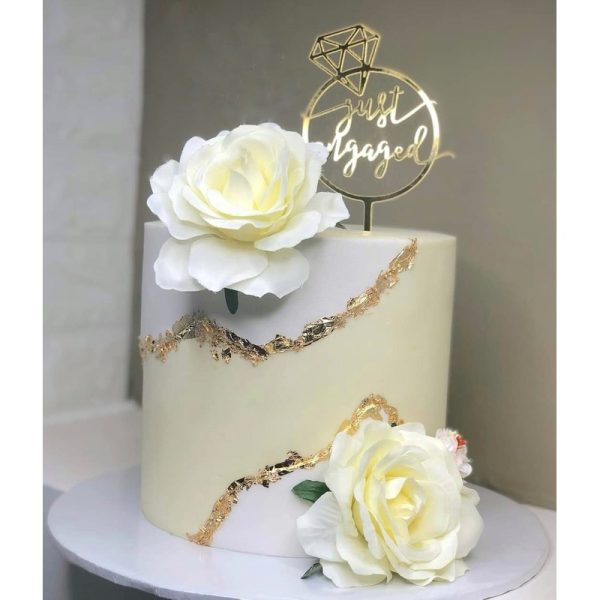 Tall And Fancy Engagement cake